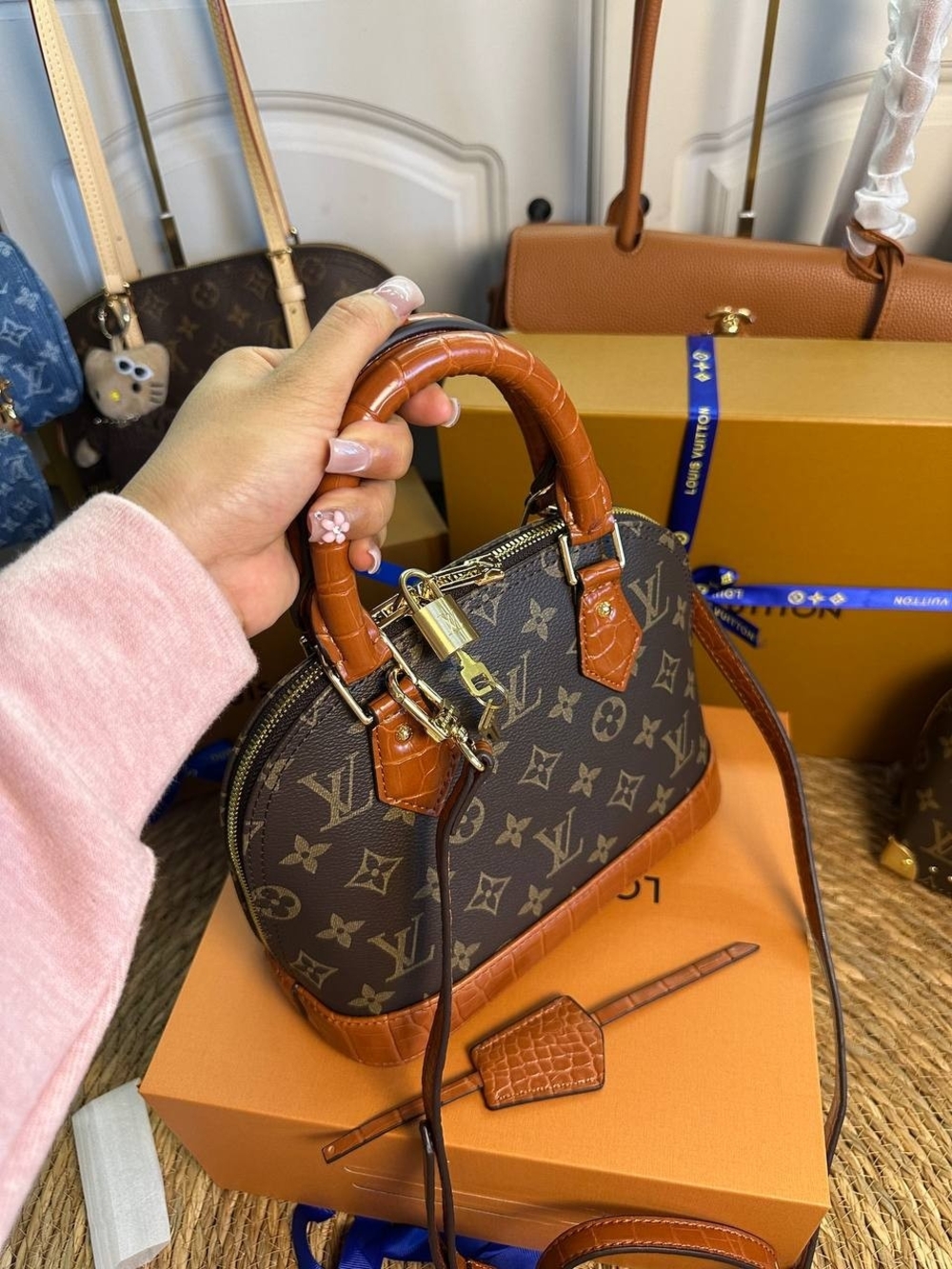 Louis Vuitton Monogram Alma BB Satchel in Brown/Caramel - Picture 6 of 9
